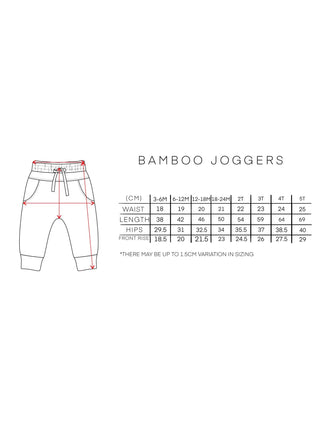 A pair of sand-colored organic bamboo joggers for babies and toddlers. Sizing Guide